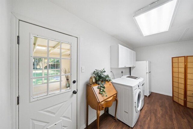 3431 Bristlecone Trl, Spring, TX 77380 - laundry room with cabinet space, dark wood finished floors, washing machine and dryer, and baseboards