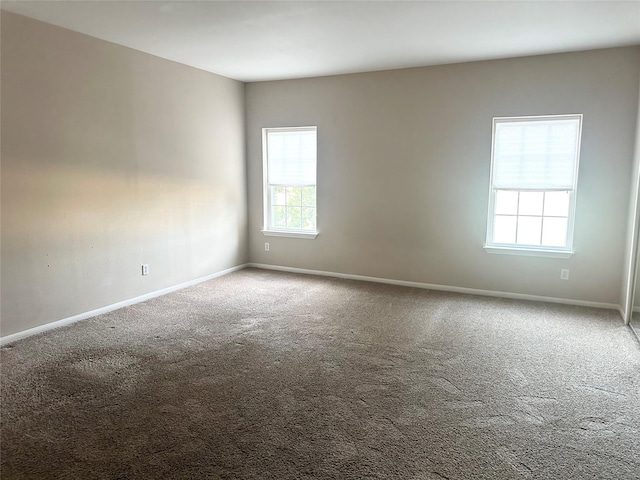 2924 Holly Hall St Unit 2924, Houston, TX 77054 - carpeted empty room with baseboards