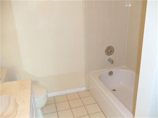2924 Holly Hall St Unit 2924, Houston, TX 77054 - bathroom with tile patterned flooring, vanity, toilet, and shower / washtub combination