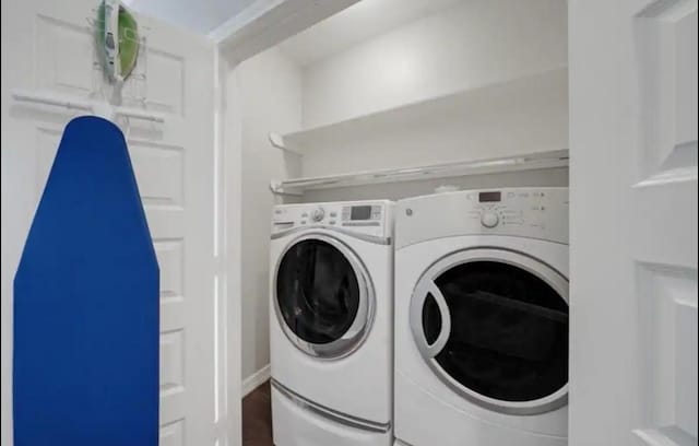 6617 Del Rio St Unit D, Houston, TX 77021 - washroom featuring washer and dryer