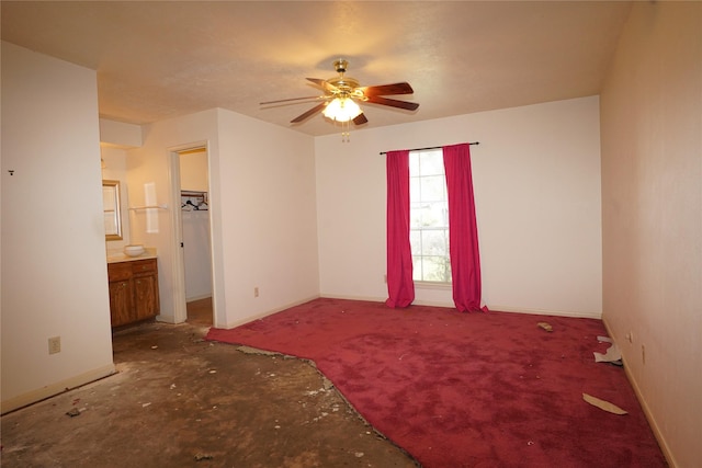 1501 N Park Side Dr, Deer Park, TX 77536 - unfurnished bedroom featuring baseboards, ensuite bathroom, and a ceiling fan