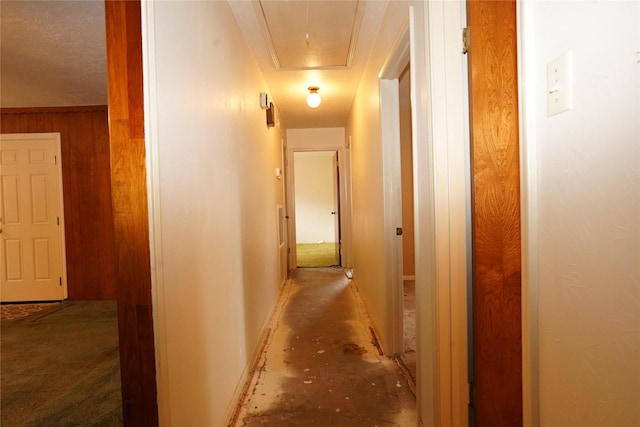 1501 N Park Side Dr, Deer Park, TX 77536 - corridor with attic access, baseboards, and wood walls