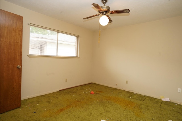 1501 N Park Side Dr, Deer Park, TX 77536 - carpeted empty room featuring a ceiling fan and baseboards