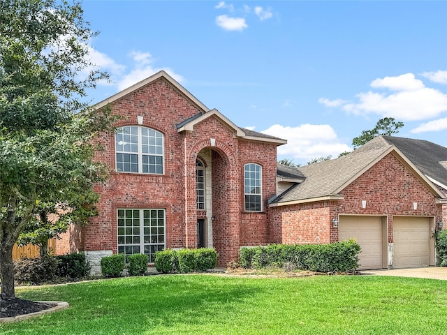 16019 Rustlers Trail Ln, Cypress, TX 77429 - traditional-style house with brick siding, a front yard, and a garage