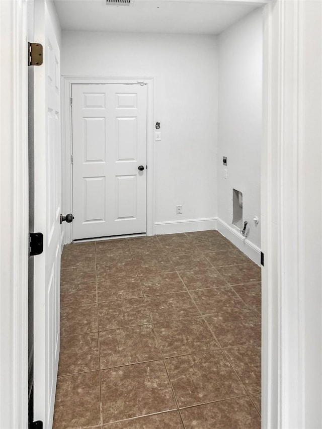 16019 Rustlers Trail Ln, Cypress, TX 77429 - washroom featuring hookup for an electric dryer, gas dryer hookup, and baseboards