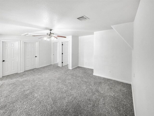 16019 Rustlers Trail Ln, Cypress, TX 77429 - additional living space with ceiling fan, carpet flooring, and baseboards