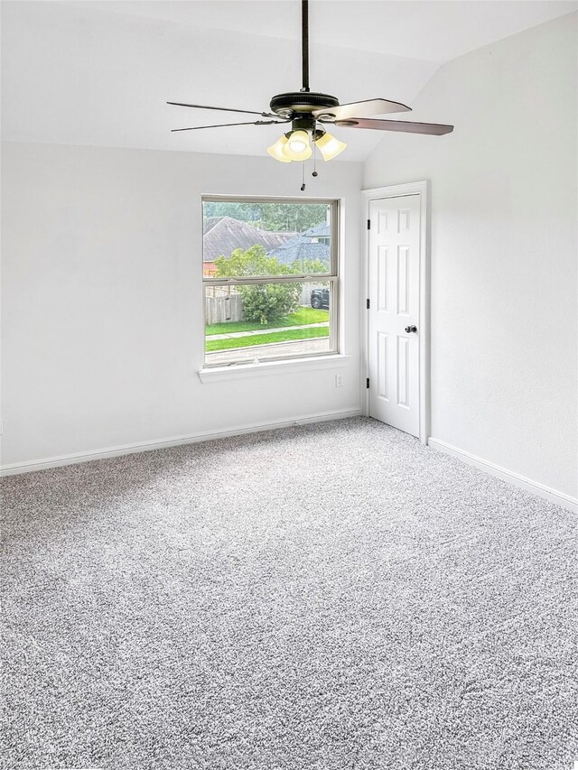 16019 Rustlers Trail Ln, Cypress, TX 77429 - empty room with ceiling fan, baseboards, carpet flooring, and lofted ceiling