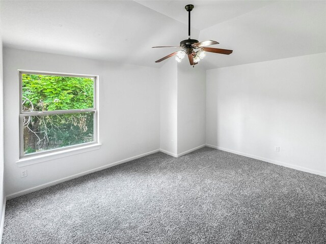 16019 Rustlers Trail Ln, Cypress, TX 77429 - carpeted empty room with ceiling fan, baseboards, and vaulted ceiling