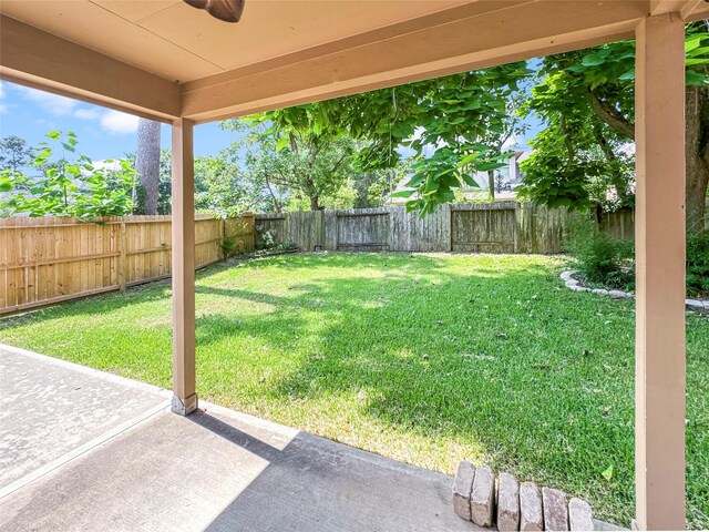 16019 Rustlers Trail Ln, Cypress, TX 77429 - view of yard featuring a patio area and a ceiling fan