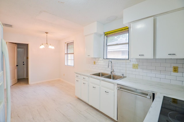 10947 Vanderford Dr, Houston, TX 77099 - kitchen featuring stainless steel dishwasher, a sink, decorative backsplash, light countertops, and a chandelier
