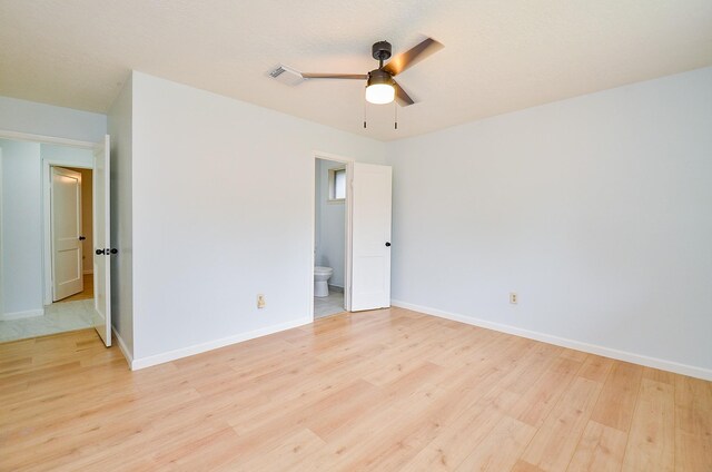 10947 Vanderford Dr, Houston, TX 77099 - unfurnished room featuring light wood-style flooring, a ceiling fan, and baseboards