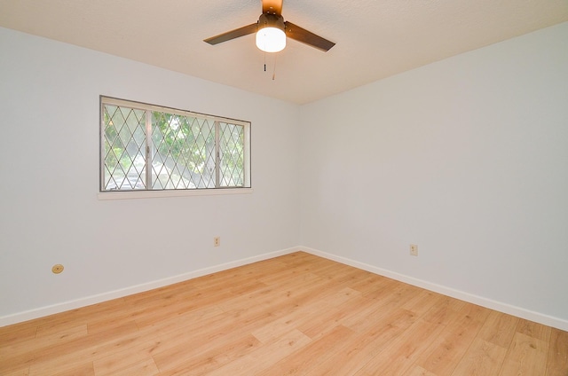 10947 Vanderford Dr, Houston, TX 77099 - spare room featuring light wood finished floors, baseboards, and a ceiling fan