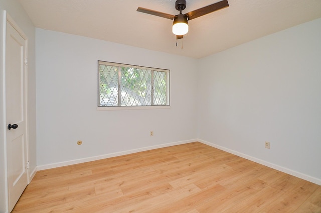 10947 Vanderford Dr, Houston, TX 77099 - unfurnished room featuring light wood-style floors, ceiling fan, and baseboards