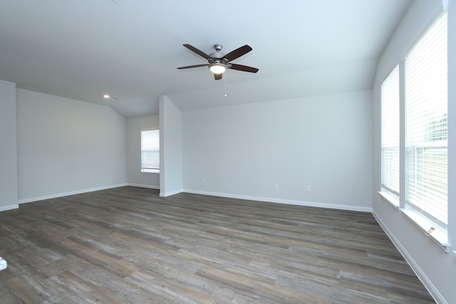 26449 Lakeshore Dr, Hempstead, TX 77445 - spare room with ceiling fan, lofted ceiling, dark wood-style flooring, baseboards, and recessed lighting