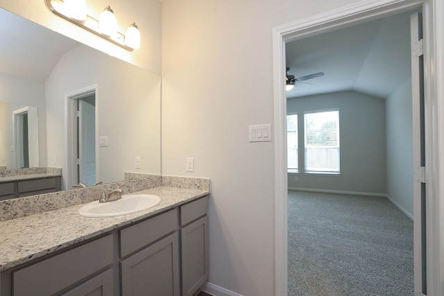 26449 Lakeshore Dr, Hempstead, TX 77445 - bathroom featuring lofted ceiling, ceiling fan, baseboards, and vanity