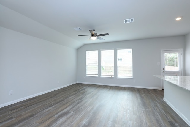 26449 Lakeshore Dr, Hempstead, TX 77445 - unfurnished living room featuring ceiling fan, dark wood-style flooring, baseboards, vaulted ceiling, and recessed lighting