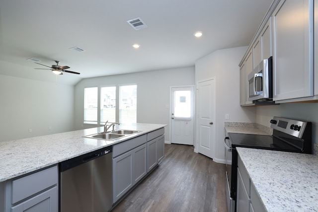 26449 Lakeshore Dr, Hempstead, TX 77445 - kitchen with appliances with stainless steel finishes, a sink, gray cabinets, dark wood-style floors, and ceiling fan