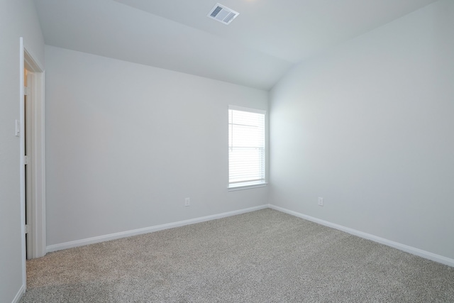 26449 Lakeshore Dr, Hempstead, TX 77445 - carpeted empty room featuring lofted ceiling and baseboards