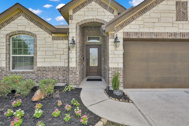 3921 Enchanted Timbers Ln, Spring, TX 77386 - doorway to property featuring stone siding, an attached garage, concrete driveway, and brick siding