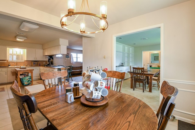 5423 Willow Creek Way, Houston, TX 77017 - dining area with a chandelier and light tile patterned floors