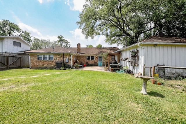 5423 Willow Creek Way, Houston, TX 77017 - back of property featuring a patio, a chimney, and brick siding