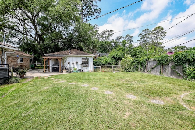 5423 Willow Creek Way, Houston, TX 77017 - view of yard with central AC unit and a patio area