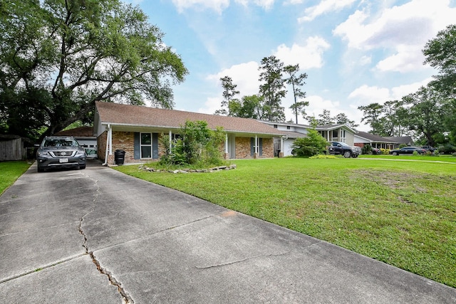 5423 Willow Creek Way, Houston, TX 77017 - view of front of property featuring a front yard, brick siding, and driveway