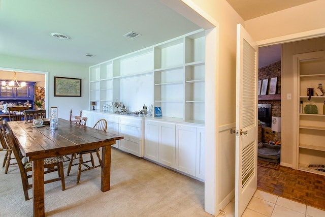 5423 Willow Creek Way, Houston, TX 77017 - dining area featuring a chandelier and built in shelves