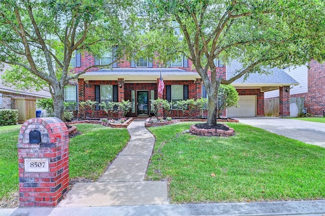 8507 Marchelle Ln, Spring, TX 77379 - view of front of home with brick siding, driveway, and a garage