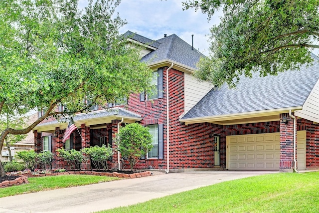 8507 Marchelle Ln, Spring, TX 77379 - view of front of house featuring a shingled roof, brick siding, concrete driveway, and a front yard