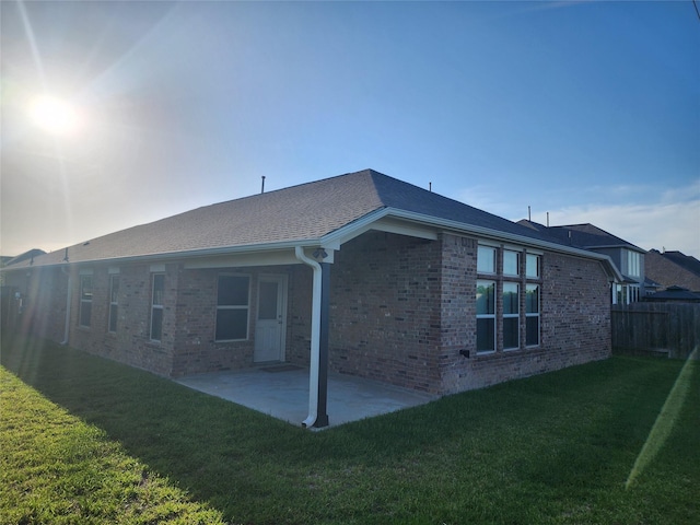 6006 Thief River Falls Dr, Katy, TX 77493 - back of property featuring brick siding and a patio area
