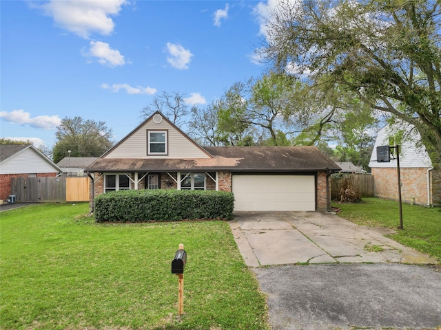2315 37th Ave N, Texas City, TX 77590 - view of front of house featuring brick siding, a garage, concrete driveway, and roof with shingles