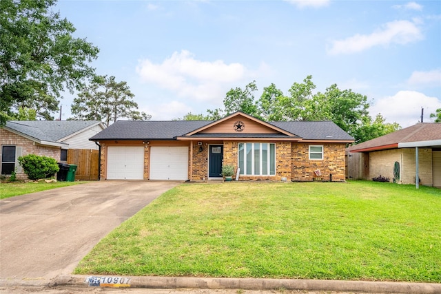 10907 Overlea Dr, Houston, TX 77089 - view of front facade featuring an attached garage, driveway, brick siding, and roof with shingles
