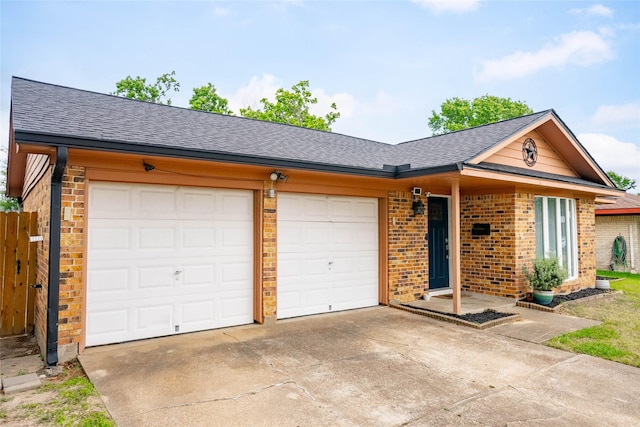 10907 Overlea Dr, Houston, TX 77089 - ranch-style house featuring a shingled roof, brick siding, and driveway