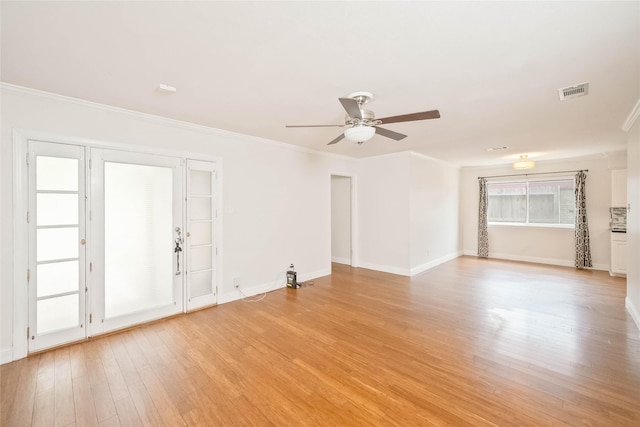 10907 Overlea Dr, Houston, TX 77089 - empty room with ceiling fan, light wood-style floors, crown molding, and baseboards