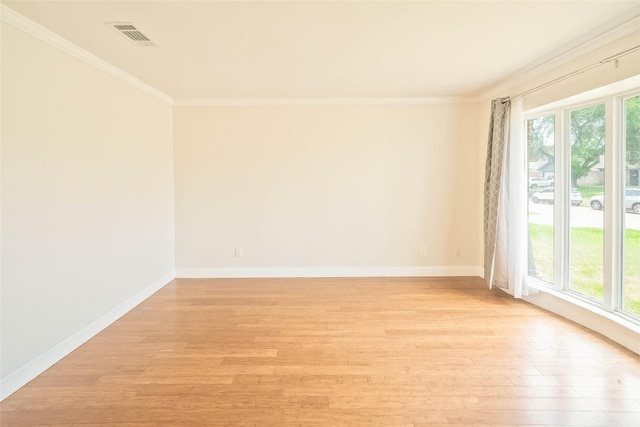 10907 Overlea Dr, Houston, TX 77089 - unfurnished room with light wood-type flooring, crown molding, and baseboards