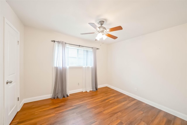 10907 Overlea Dr, Houston, TX 77089 - spare room with a ceiling fan, wood finished floors, and baseboards