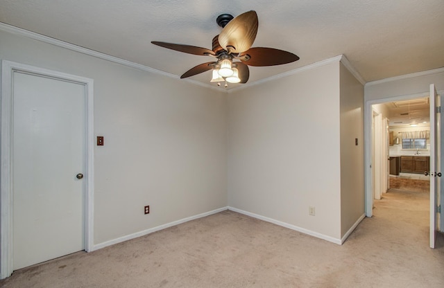 10829 E Linwood Dr, La Porte, TX 77571 - spare room with attic access, light colored carpet, ceiling fan, ornamental molding, and baseboards