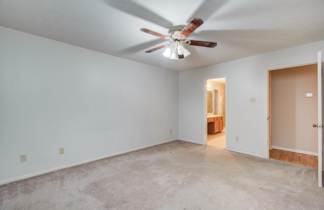 10829 E Linwood Dr, La Porte, TX 77571 - unfurnished room with ceiling fan, light carpet, and baseboards