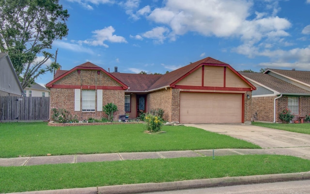 10829 E Linwood Dr, La Porte, TX 77571 - view of front of property with brick siding, a garage, and driveway