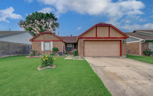 10829 E Linwood Dr, La Porte, TX 77571 - single story home with brick siding, a garage, a front lawn, and driveway