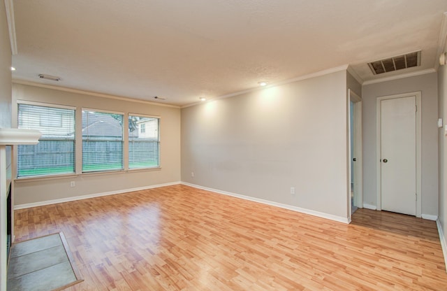10829 E Linwood Dr, La Porte, TX 77571 - unfurnished room with ornamental molding, light wood-style flooring, and baseboards