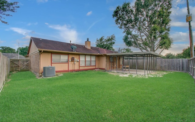 10829 E Linwood Dr, La Porte, TX 77571 - rear view of house featuring a patio, a chimney, and cooling unit