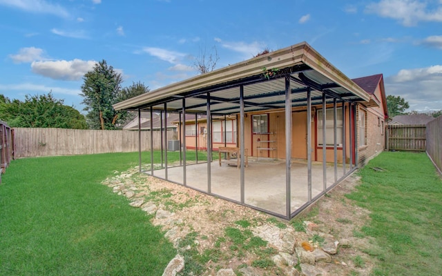 10829 E Linwood Dr, La Porte, TX 77571 - back of house featuring a patio and brick siding