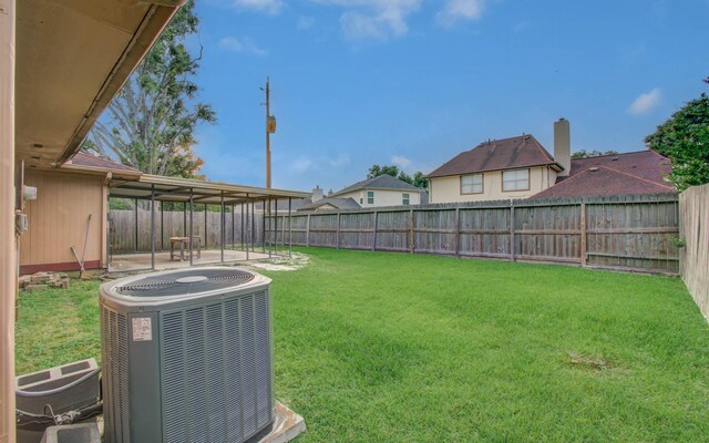 10829 E Linwood Dr, La Porte, TX 77571 - view of yard featuring cooling unit and a patio area