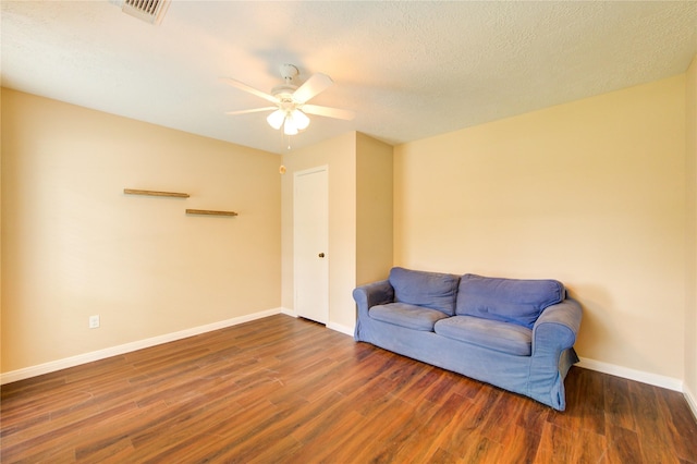 24014 Whitefield Ln, Katy, TX 77493 - living area featuring a ceiling fan, wood finished floors, and baseboards
