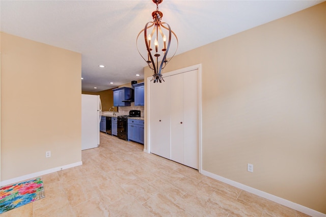 24014 Whitefield Ln, Katy, TX 77493 - unfurnished dining area featuring recessed lighting, baseboards, and a chandelier