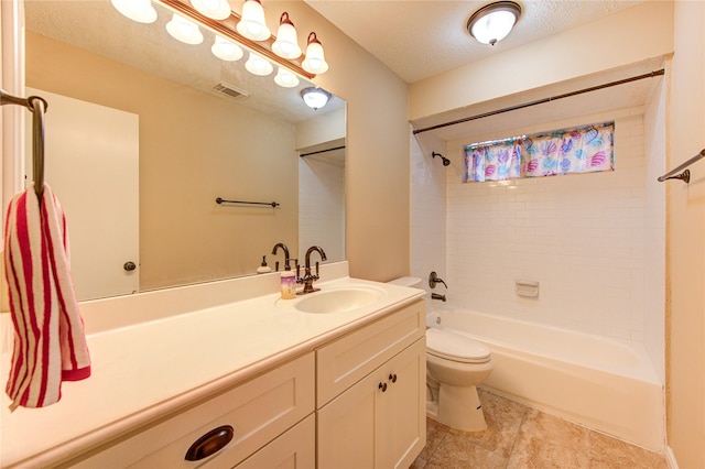 24014 Whitefield Ln, Katy, TX 77493 - bathroom with vanity, toilet, shower / washtub combination, and a textured ceiling