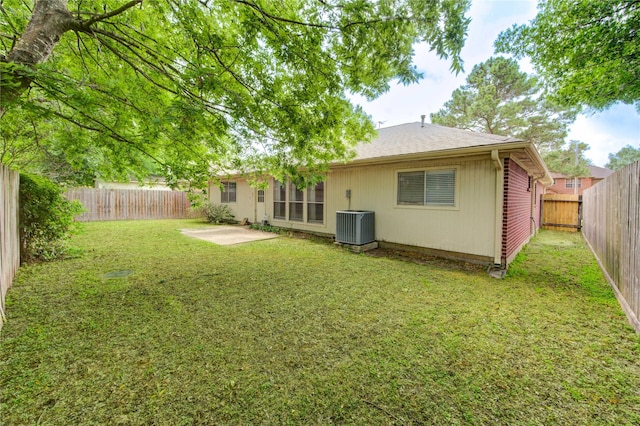 24014 Whitefield Ln, Katy, TX 77493 - back of house featuring a patio area, central AC unit, and roof with shingles