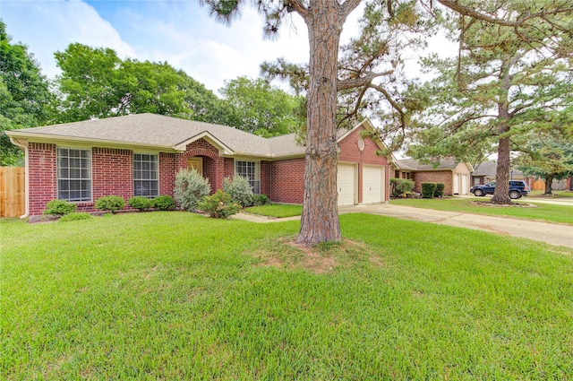 24014 Whitefield Ln, Katy, TX 77493 - ranch-style home with concrete driveway, an attached garage, brick siding, and a shingled roof